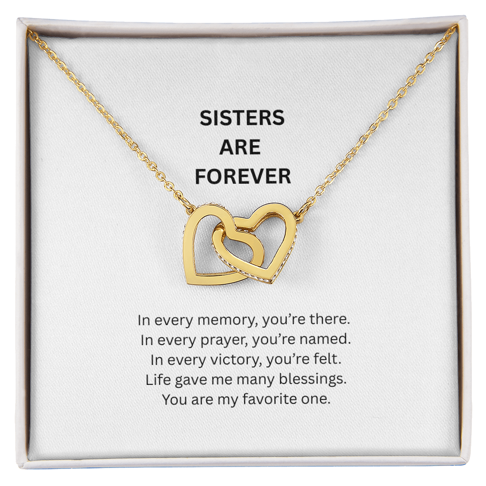 Close up of cubic zirconia interlocking hearts sister necklace